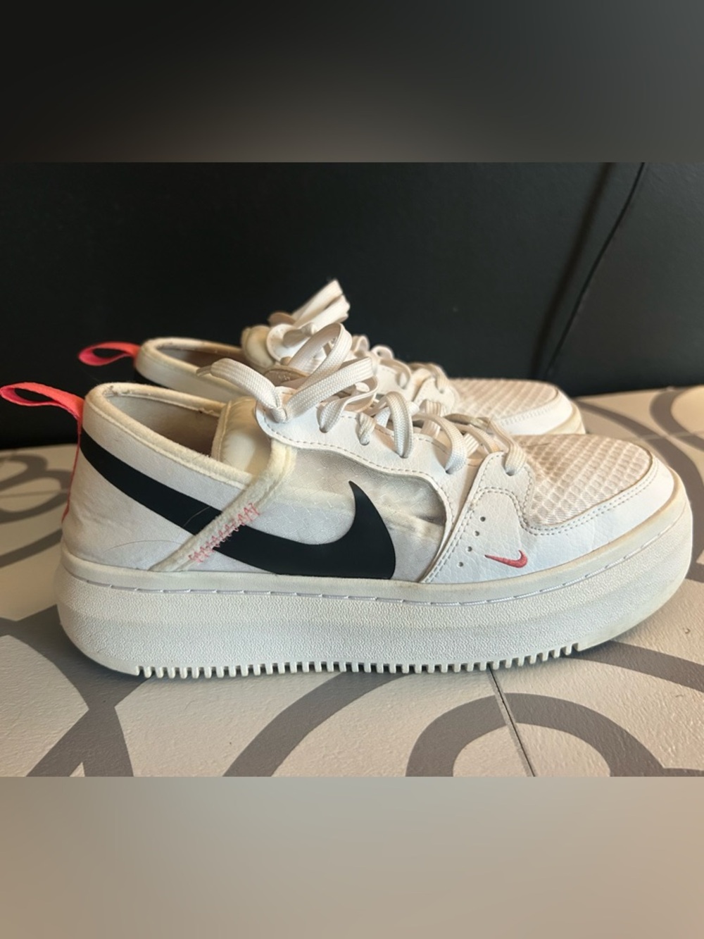 Nike Cream Low-Top Sneakers with Black Swoosh and Pink Pull Tab